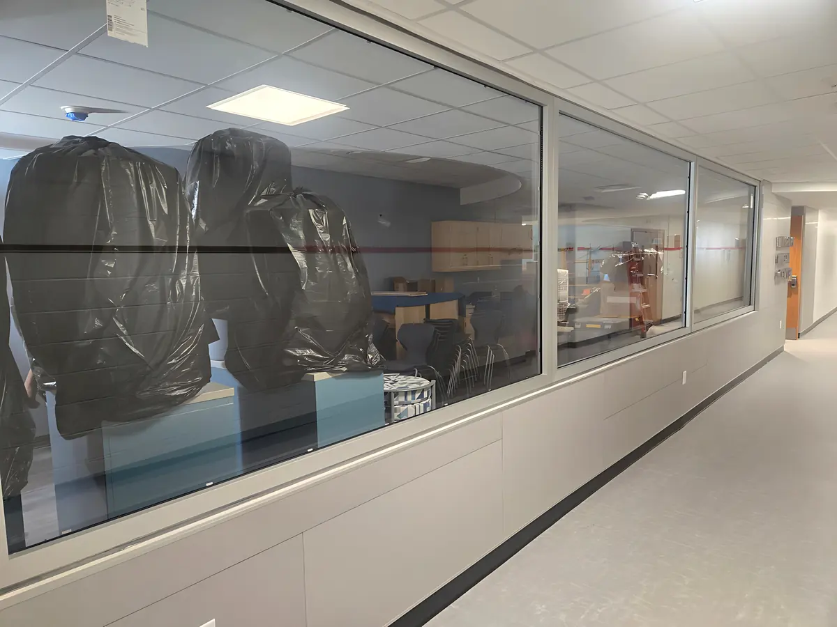 Long run of interior glass between a corridor and a classroom